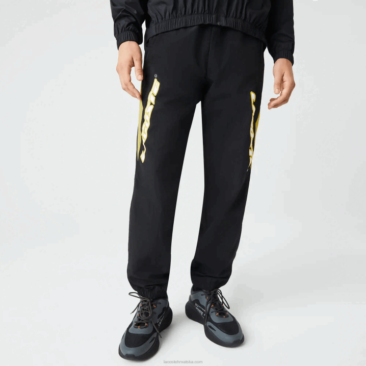 crno žuta n07 6H4B1110 muškarci Lacoste heritage regular fit color-block trenirke