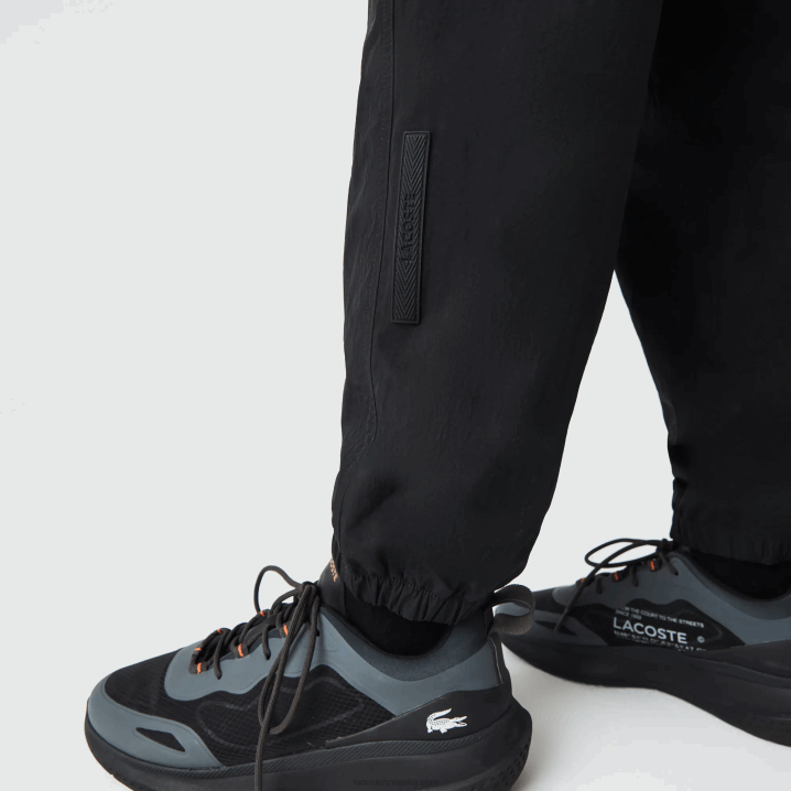 crno žuta n07 6H4B1110 muškarci Lacoste heritage regular fit color-block trenirke